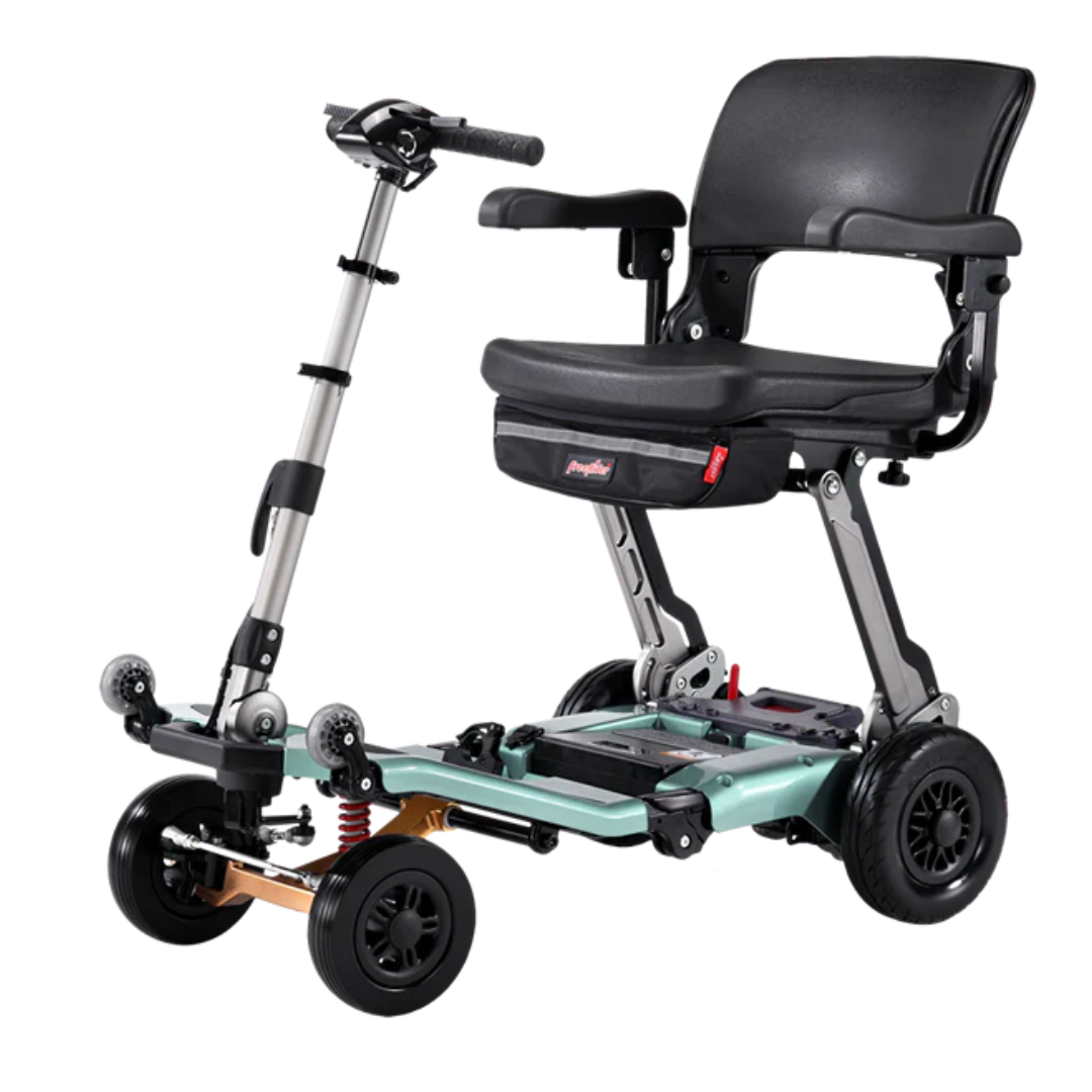 The FreeRider Luggie Super Plus 4 Travel Scooter is a compact, foldable mobility scooter with four black wheels, a padded seat with armrests, handlebar steering, and a storage pouch—perfect for travel.